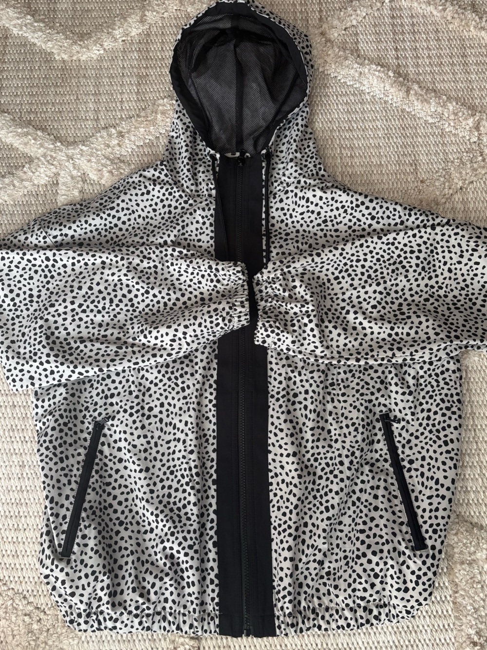 Lou & Grey Black and Cream Animal Print windbreaker jacket.